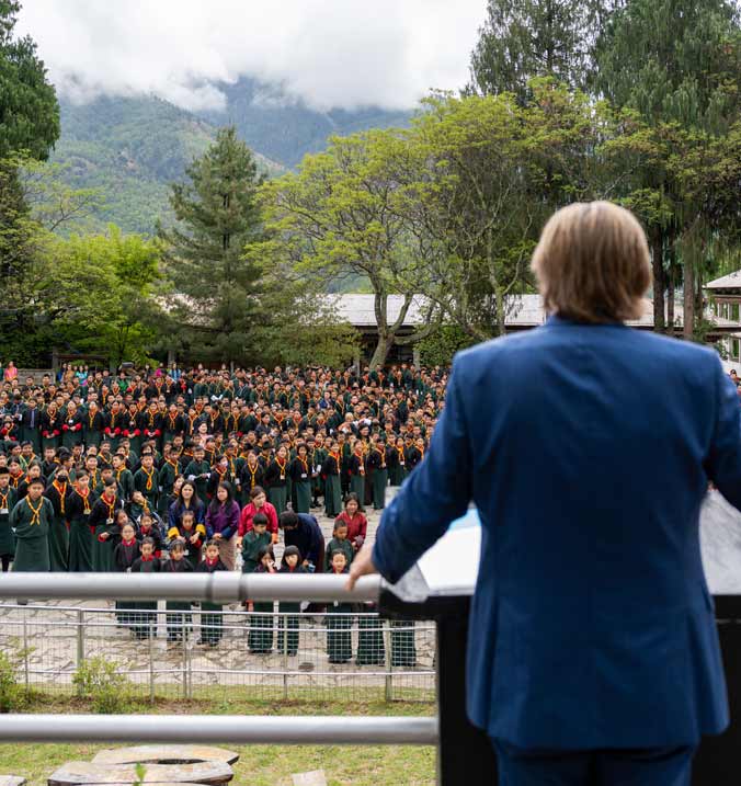 Professional event photographer capturing a live corporate event in Pemako, Thimphu.